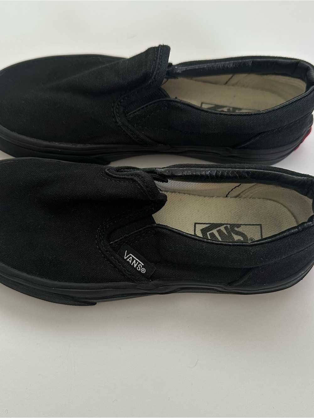 Vans Kids Slip-On Canvas Sneakers in Black